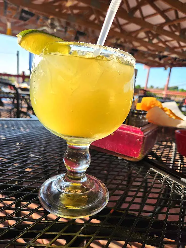 A mango margarita on the patio